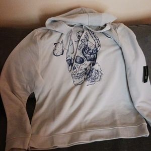 Ink skull print sweeter from ink clothing accosiated whith Macy's